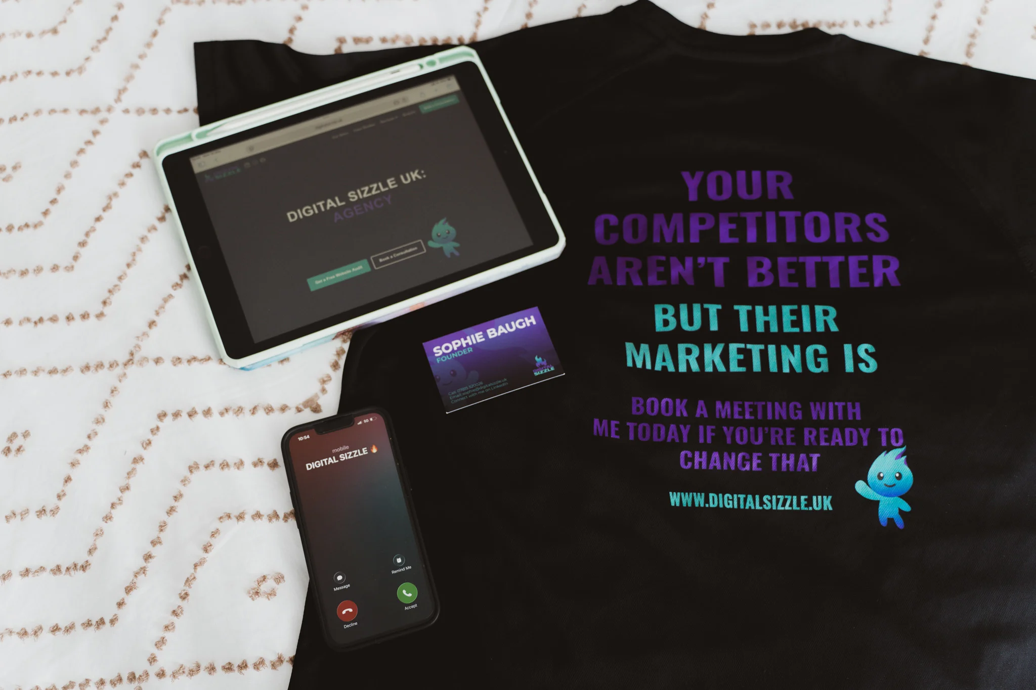 Digital Sizzle branded tablet, t-shirt, business cards and phone showcasing brand identity
